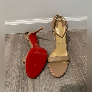 Gorgeous red bottom heels CL